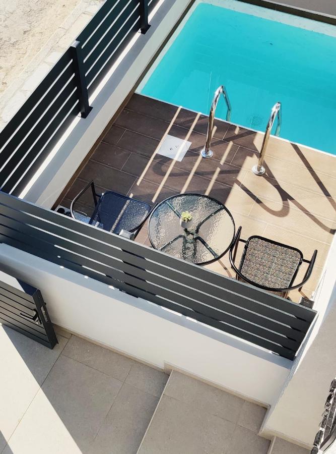 Aelia Seaside Luxury Suites Nea Karvali Bagian luar foto